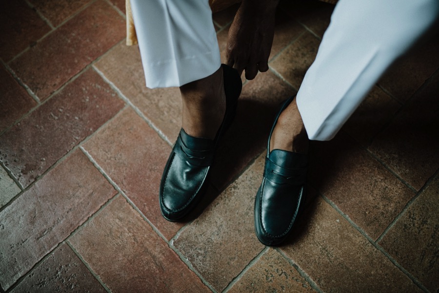 Man's wedding shoes during a wedding photoshooting