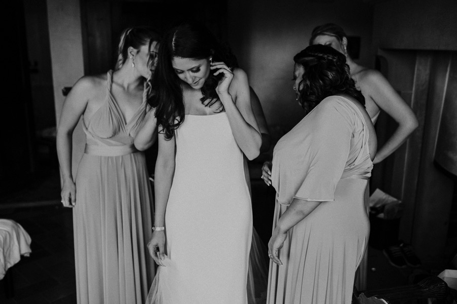 black and white portrait of a bride getting ready