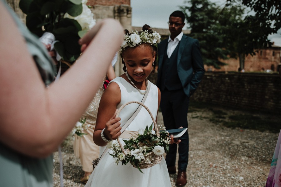 child with flower bouquet