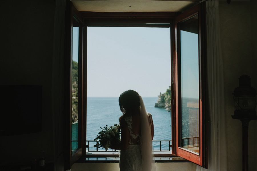 bride in front of the window of Hotel Marmorata in Ravello