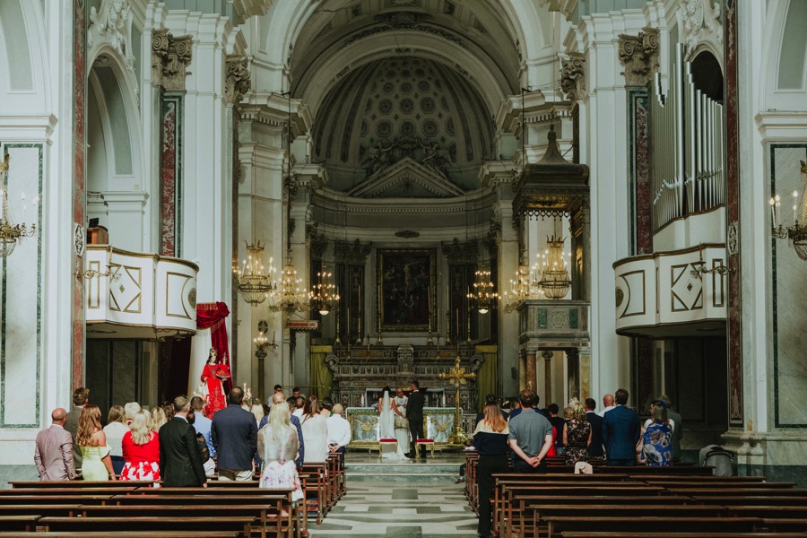 a view of Santa Trofimena church in Amalfi during a destination wedding