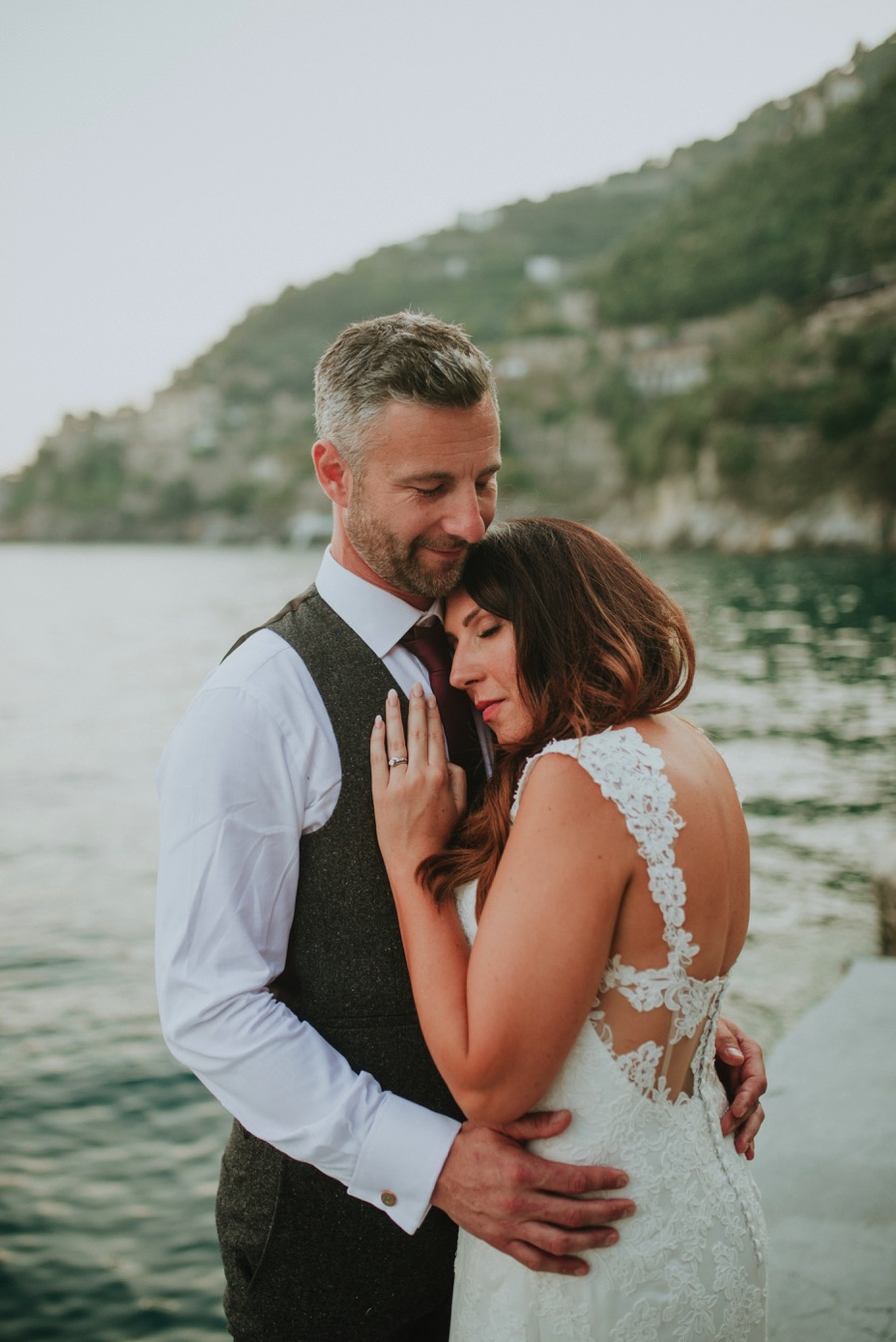 vertical portrait of Bride and groom in Hotel Marmorata by the seaside