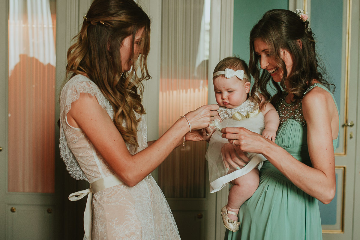 bride and sister portrait with daughter