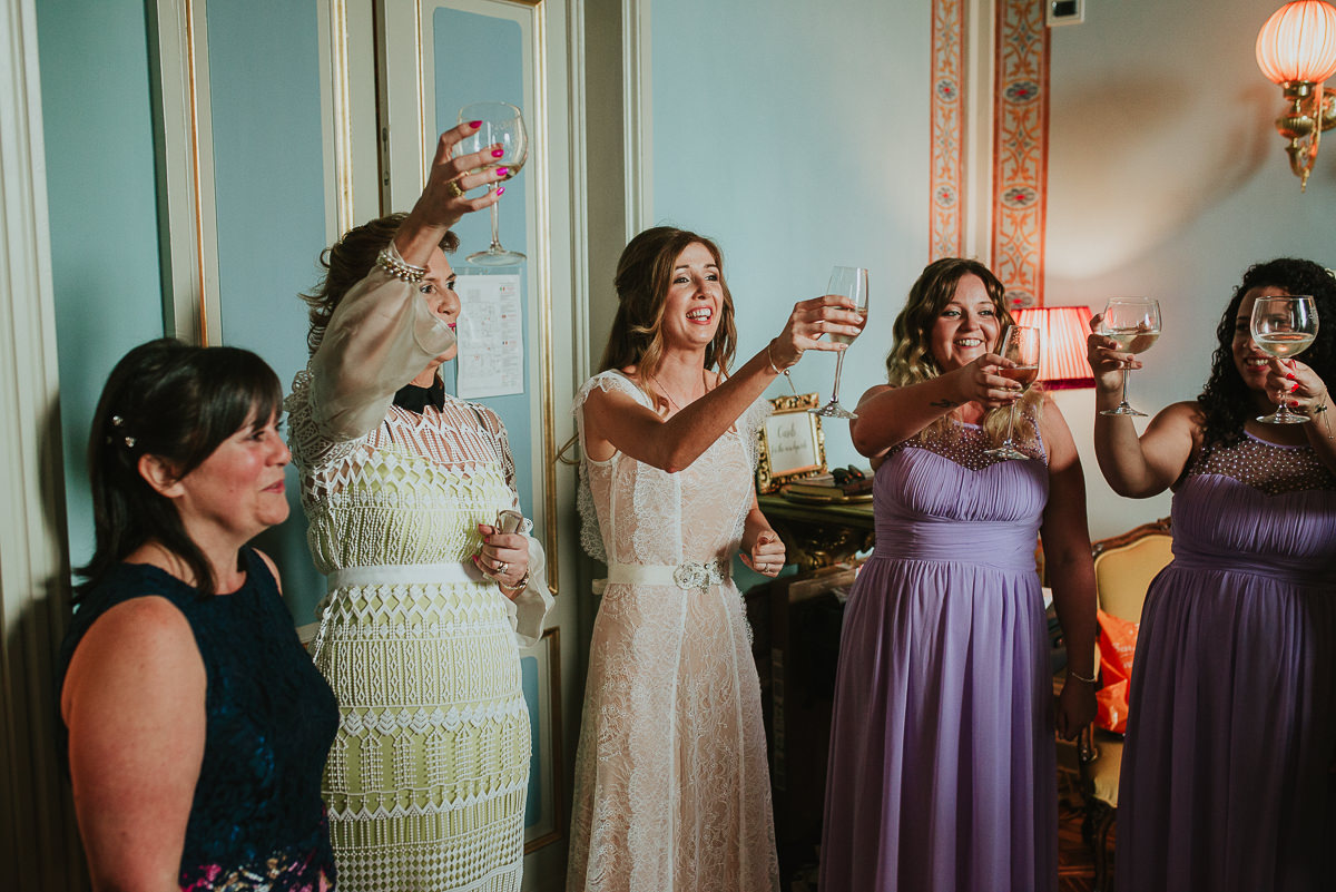 bride toast with bridesmaids