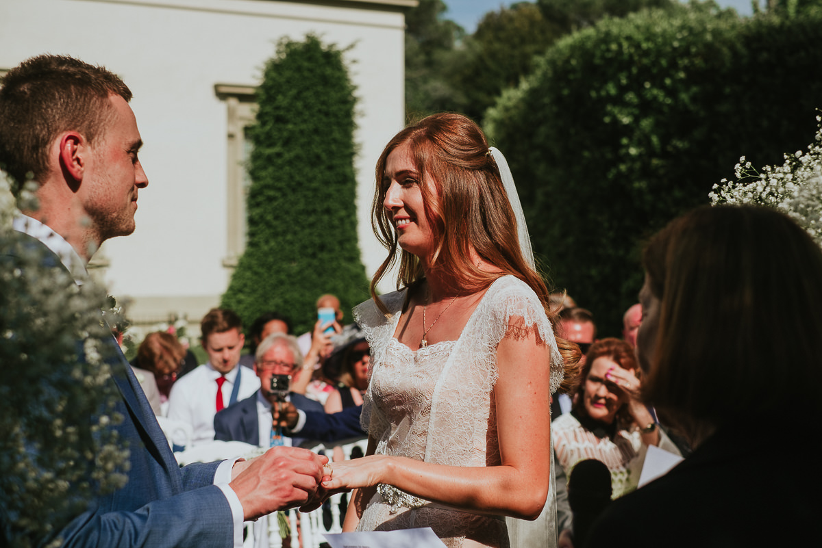 exchange of wedding ring during a destination wedding in Villa Cora