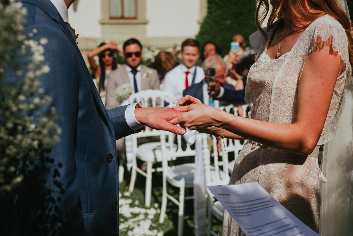 bride and groom exchange of the rings in Villa Cora Florence