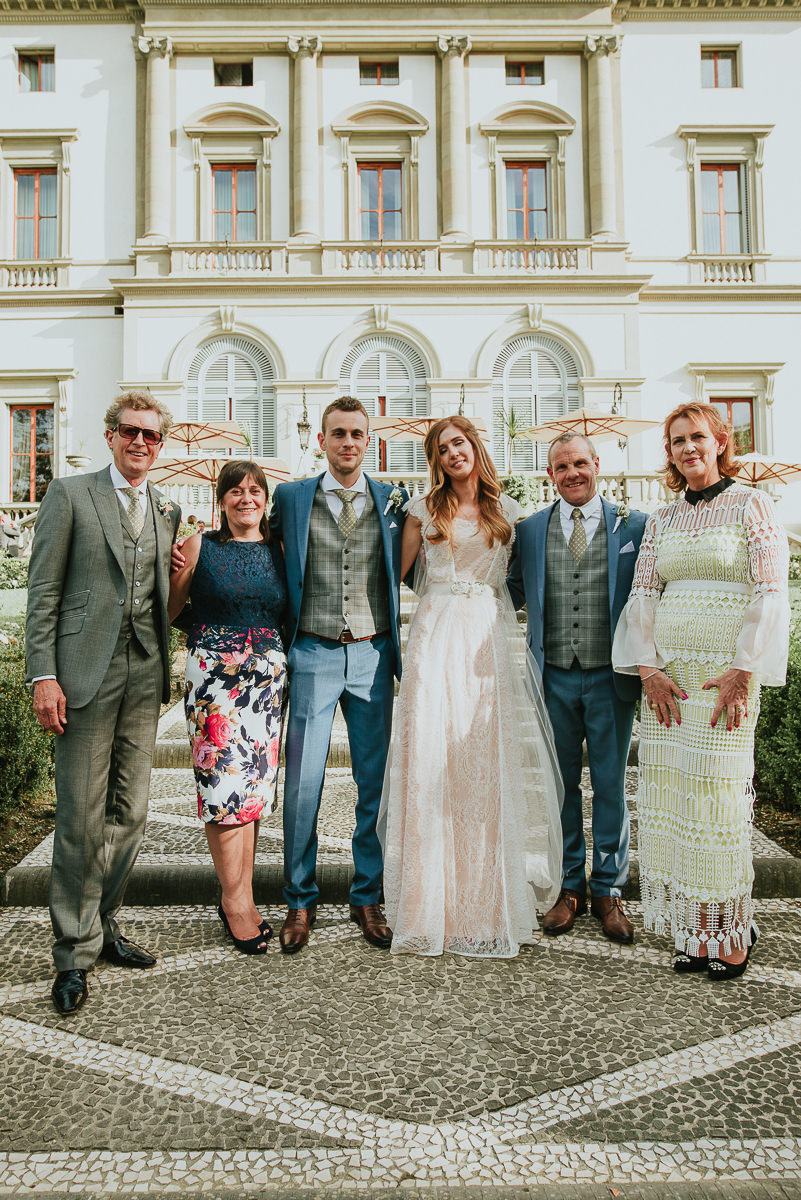 family group shot in front of Villa Cora in Florence