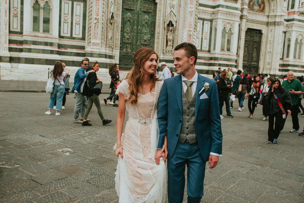 bride and groom walking in Florence during a destination wedding in Italy