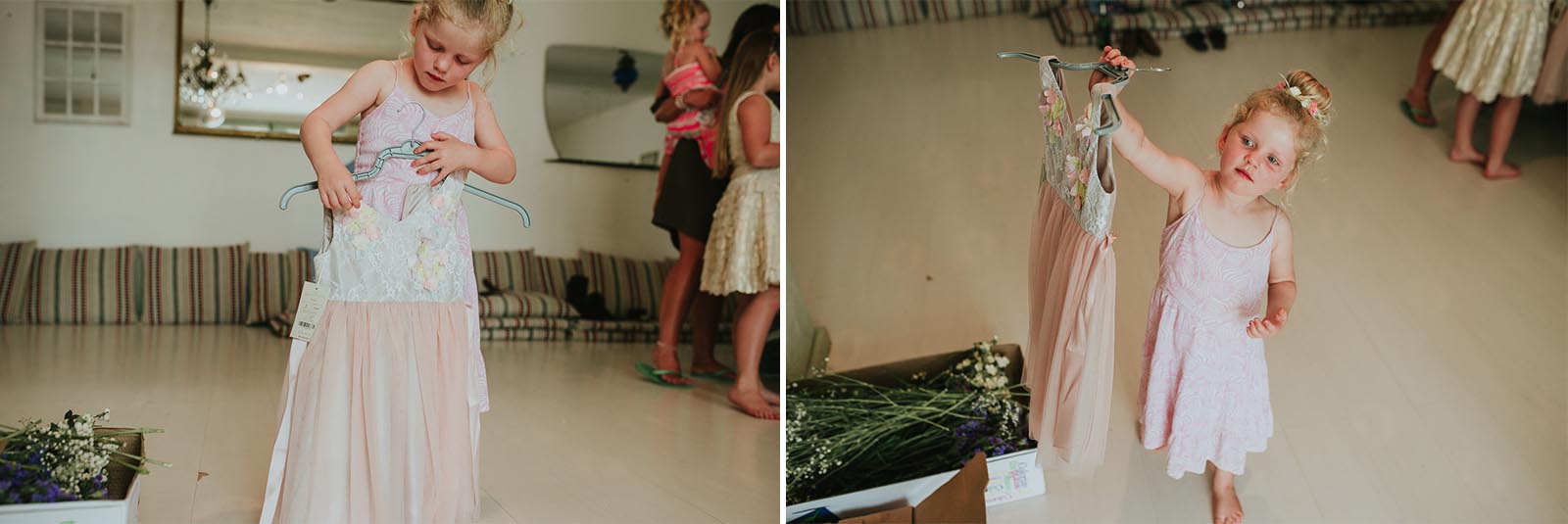 flower girl getting ready wearing pink dress