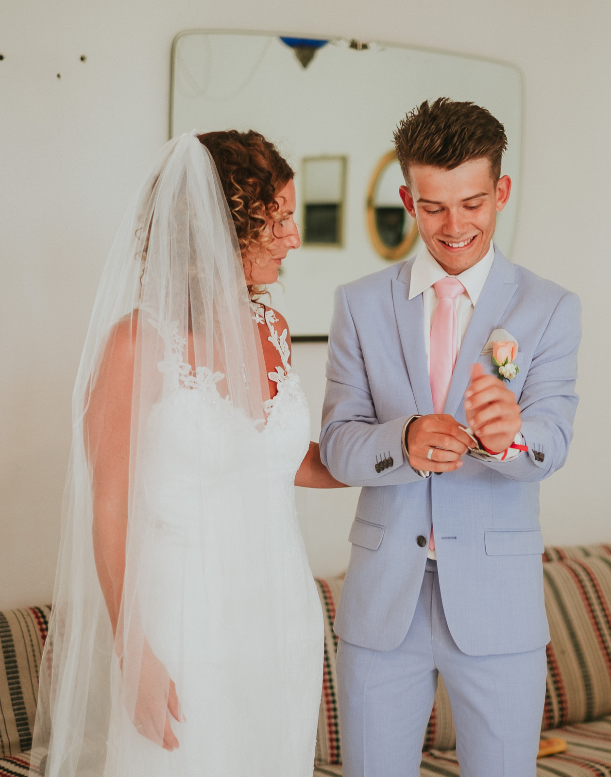 Bride's son getting ready before wedding