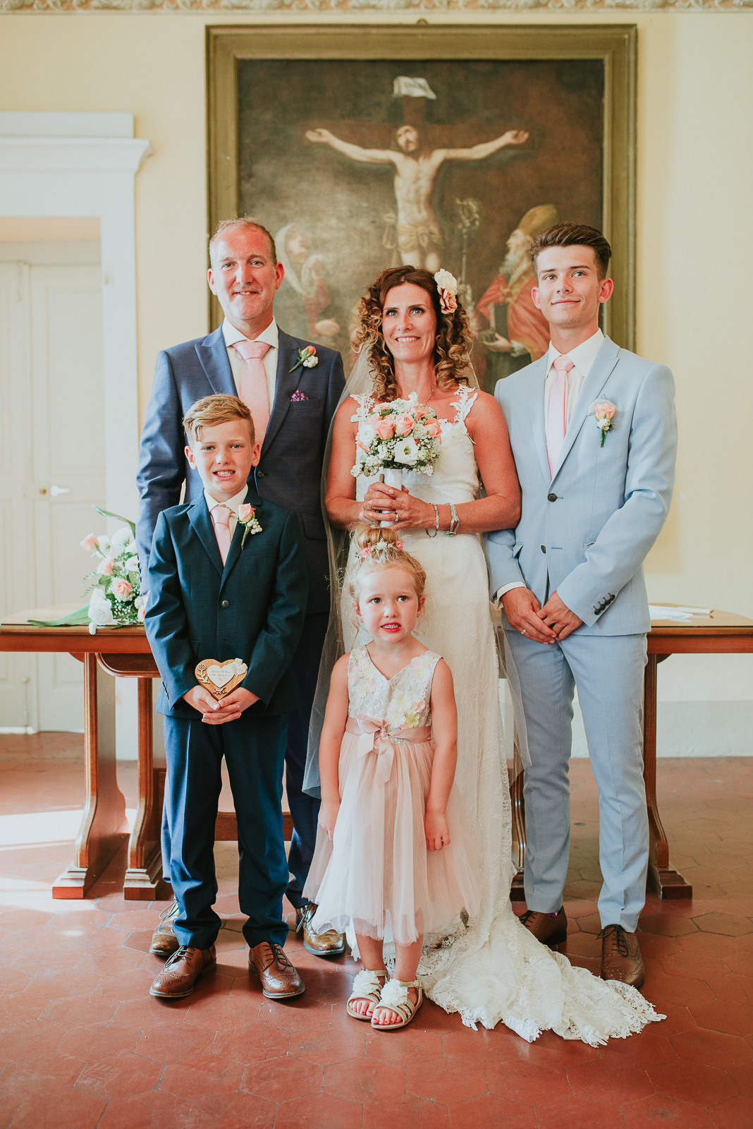 family portrait after a destination wedding in Tuscany