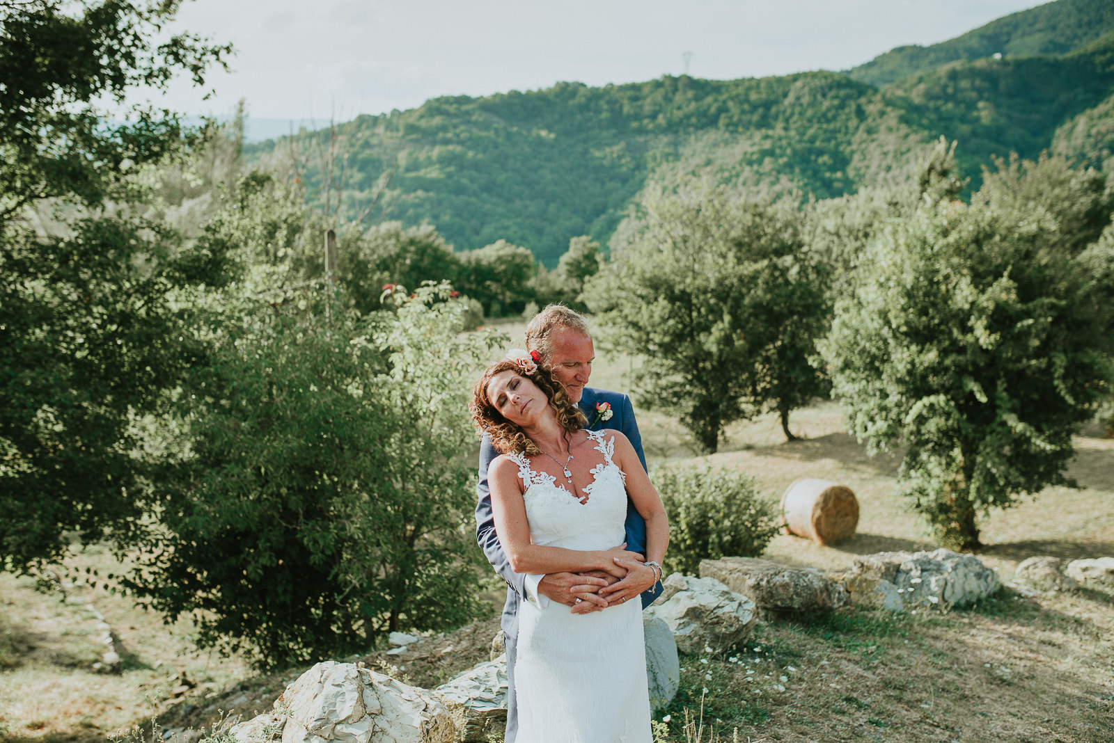 relaxed and natural portrait of bride and groom during a destination wedding in Tuscany countryside