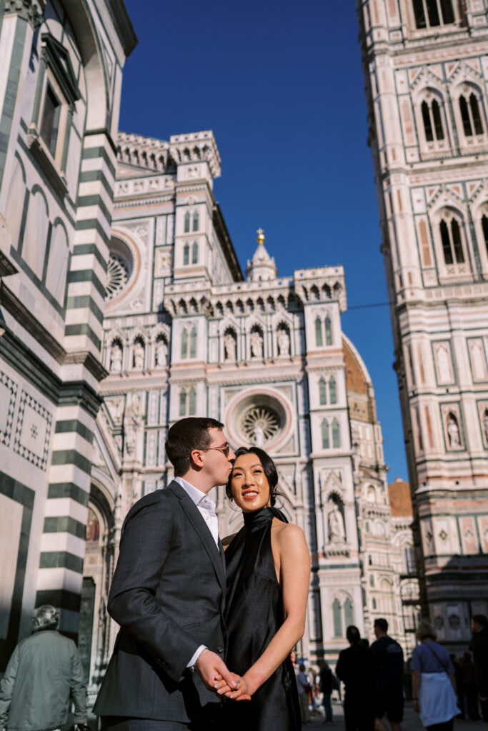 couple kissing in front of Florence Duomo
